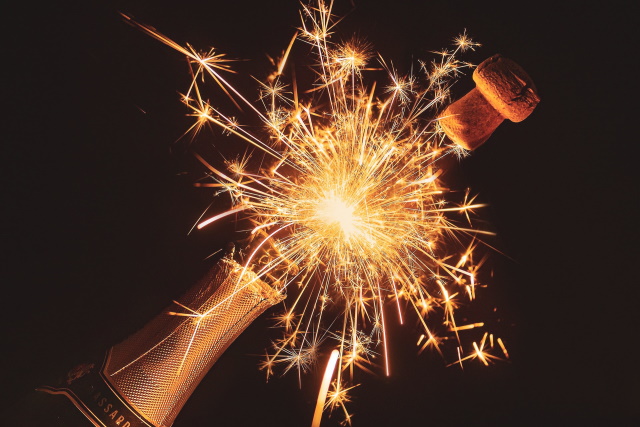 Bottle of champagne with sparkler